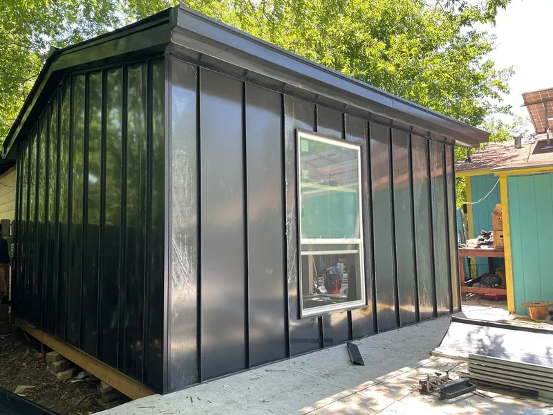 Black standing seam metal wall panels for Metal Roof Installation in Austintown